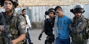 İsrail 12 Filistinli'yi gözaltına aldı