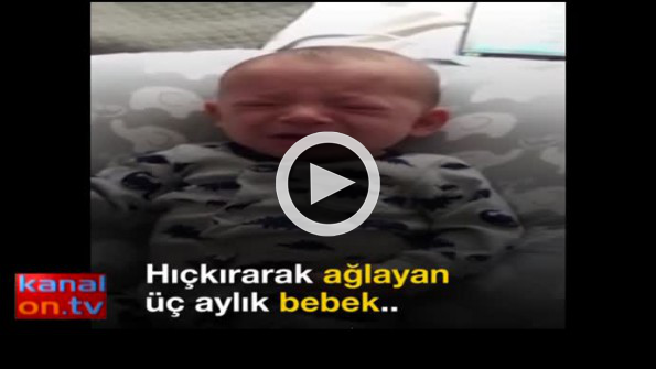 Annesinin gömleği koklatılınca ağlamayı bırakan bebek